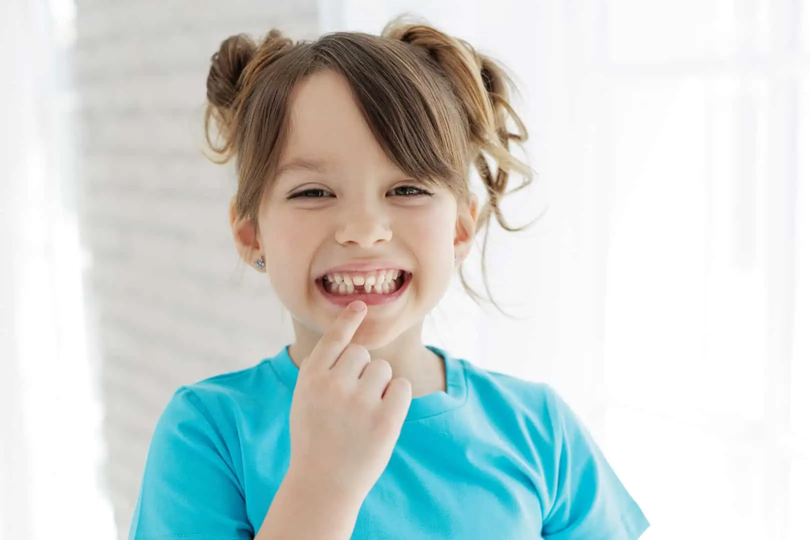 Child smiling at the dentist